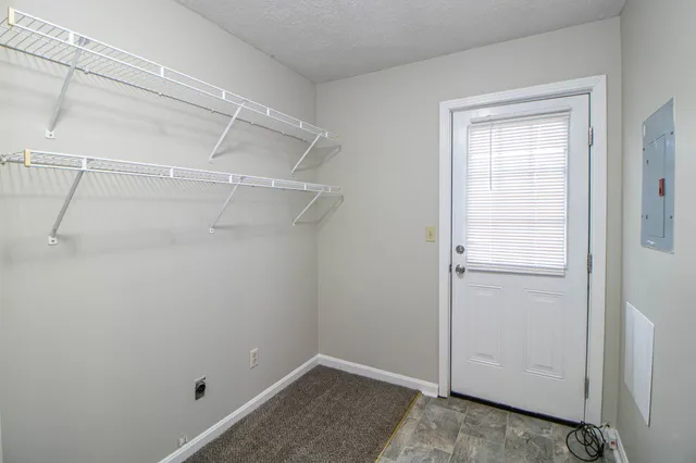 a view of a room with racks on the wall