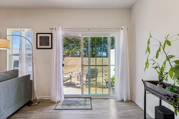 a view of entryway with wooden floor