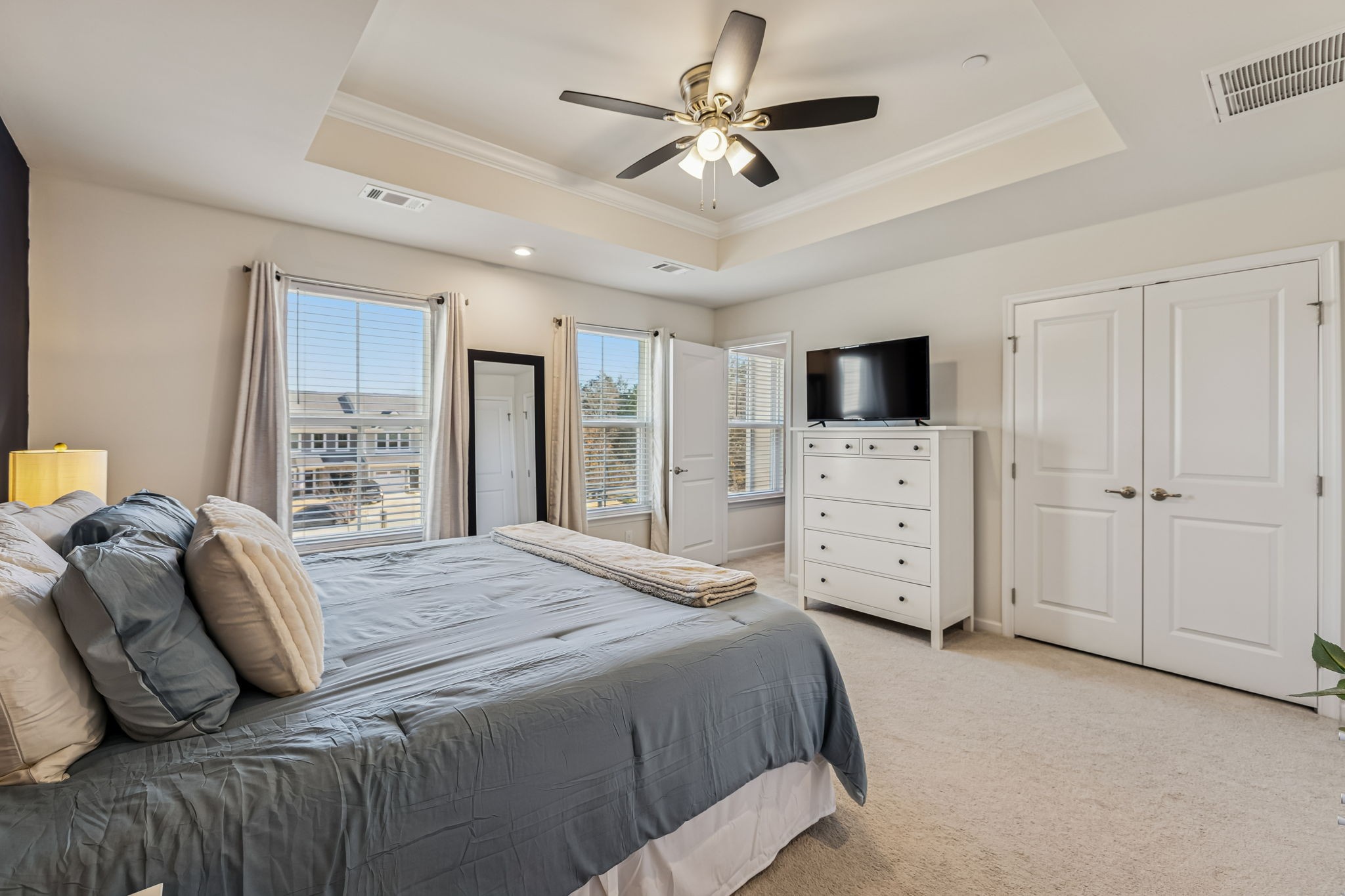 156 Keelon Gap Road Spring Hill, TN 37174 - Photo 26 of 39 a bedroom with a large bed and a tv