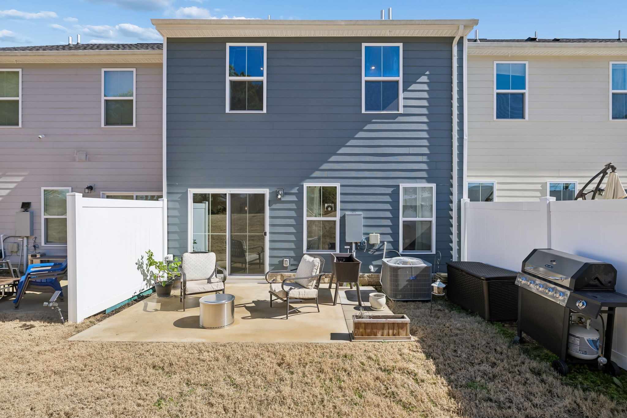 156 Keelon Gap Road Spring Hill, TN 37174 - Photo 37 of 39 a view of a dinning table and chairs in the patio