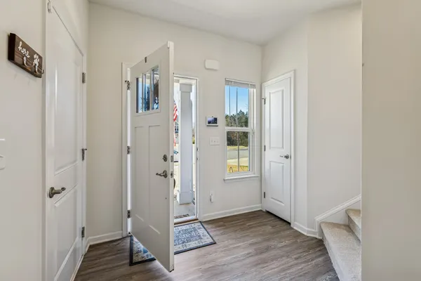 a view of a bathroom with closet area