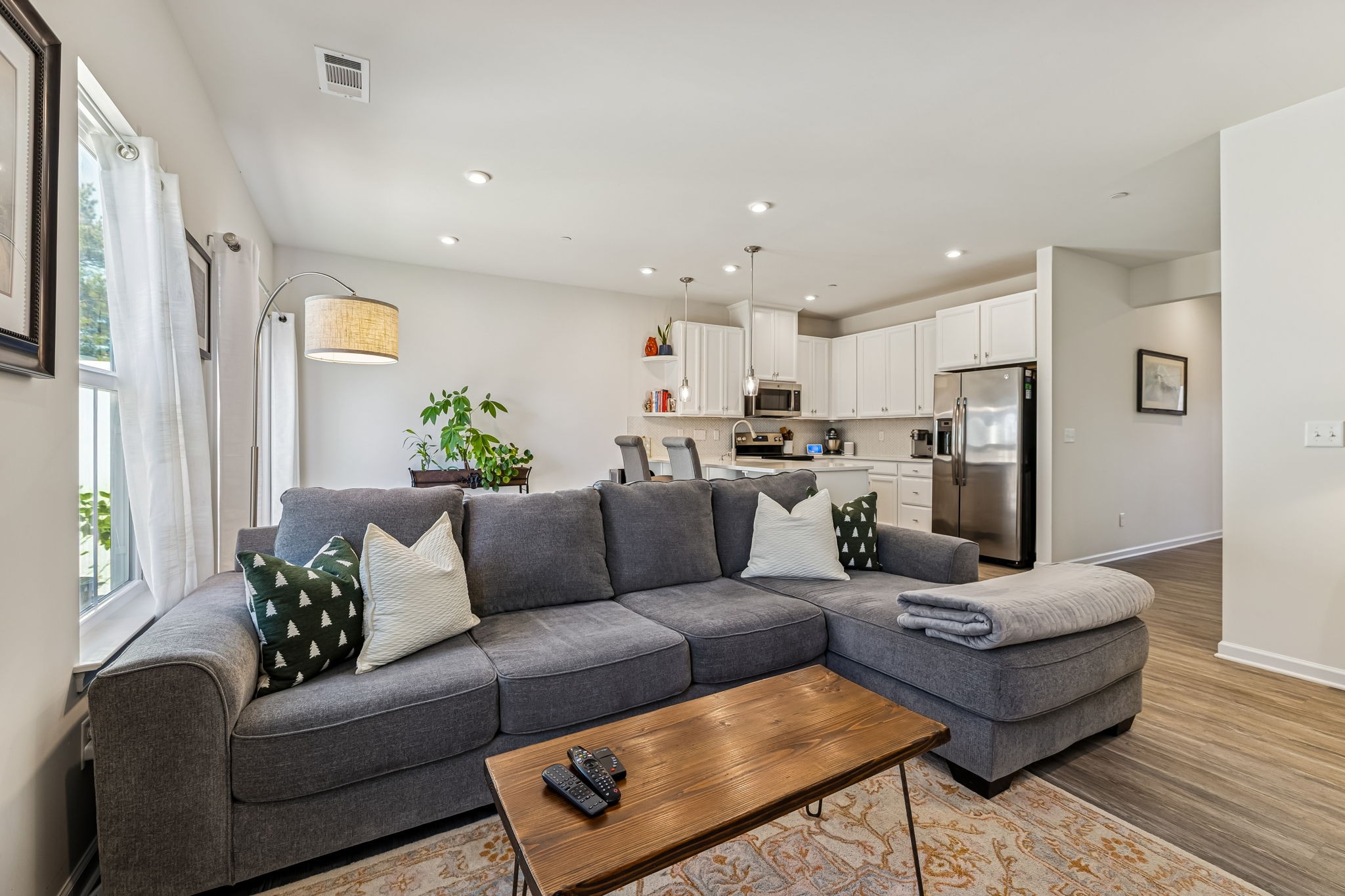 156 Keelon Gap Road Spring Hill, TN 37174 - Photo 8 of 39 a living room with furniture kitchen and a window