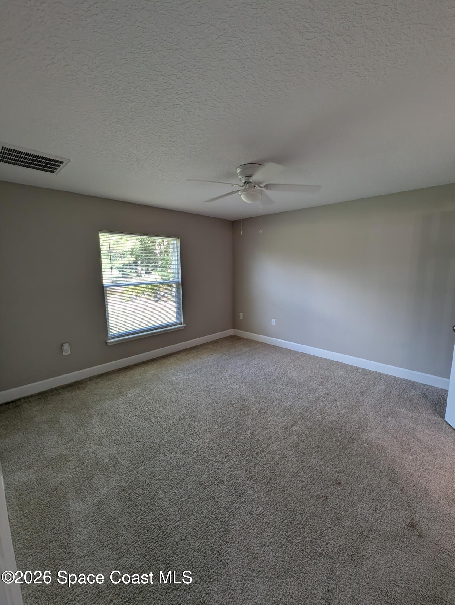 1356 Torgerson Road Southeast Palm Bay, FL 32909 - Photo 36 of 46 Primary Bedroom