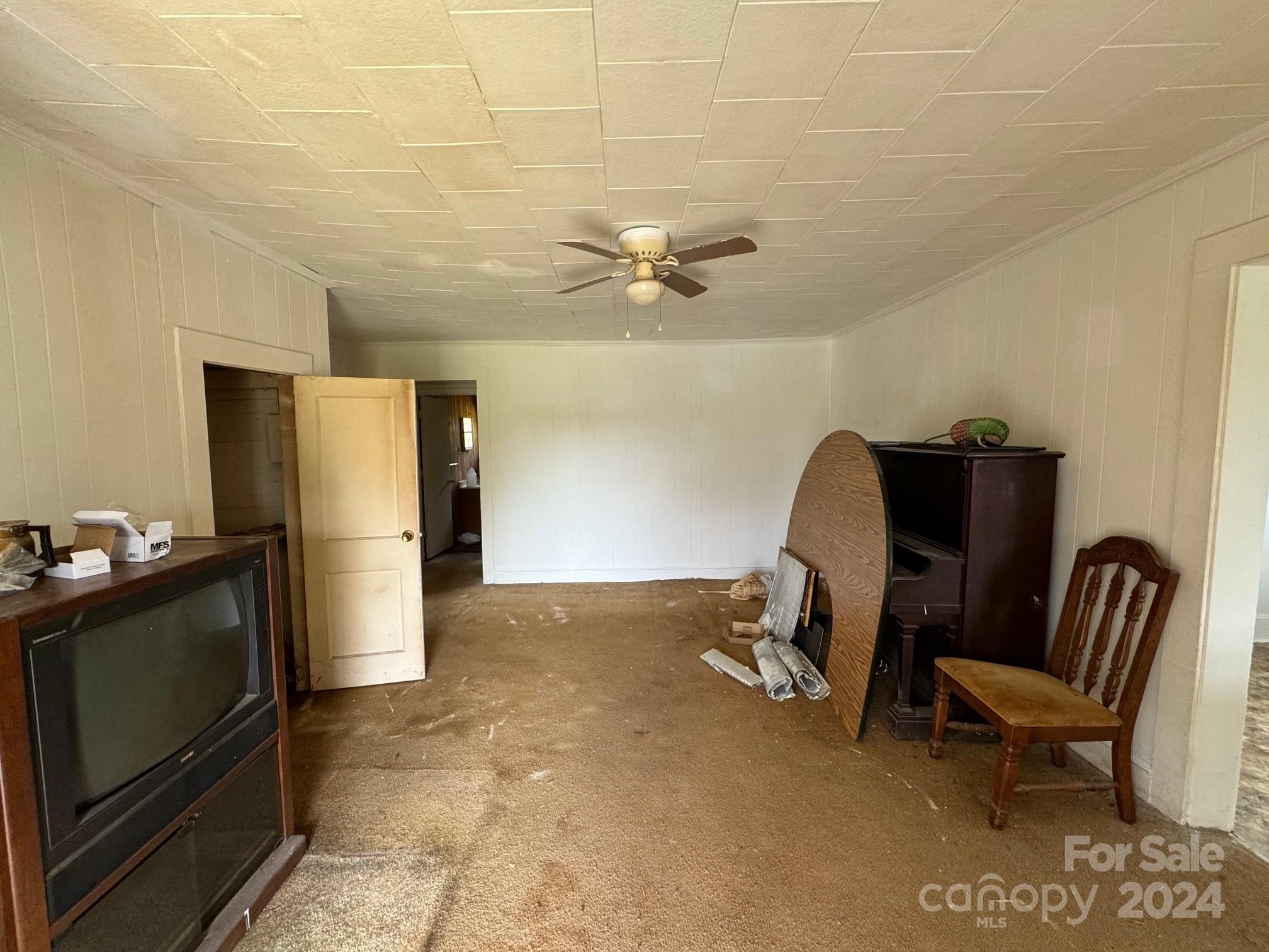 174 Lavender Road Ellenboro, NC 28040 - Photo 12 of 20 a living room with furniture and a fireplace