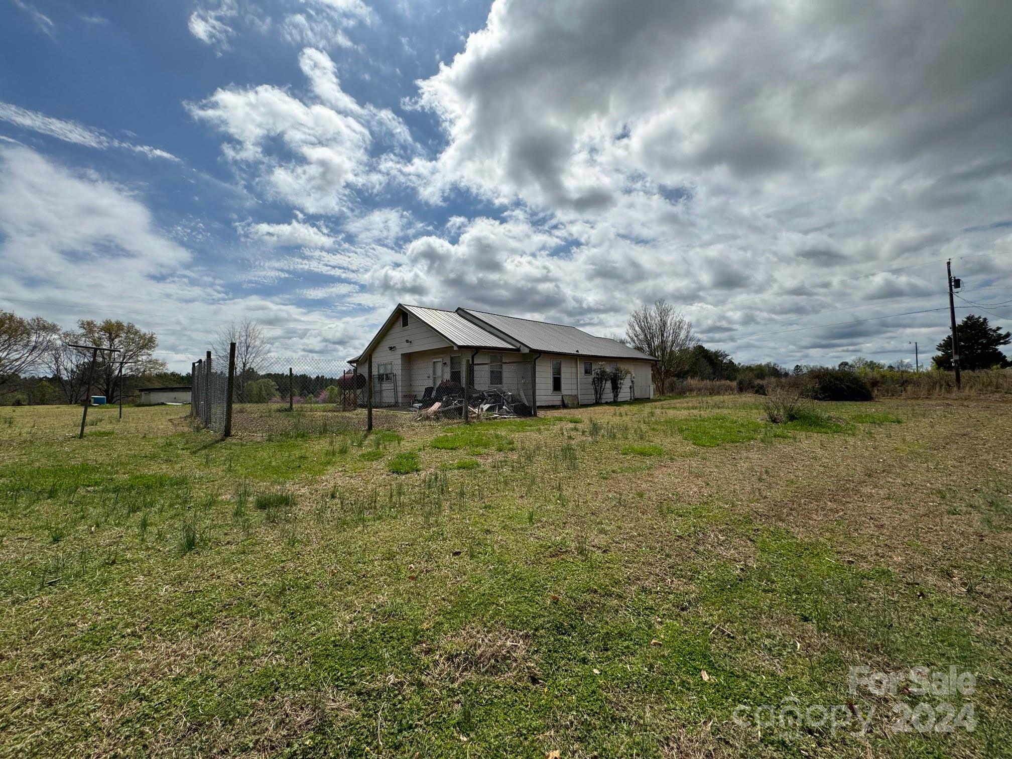 174 Lavender Road Ellenboro, NC 28040 - Photo 20 of 20 a front view of a house with a yard