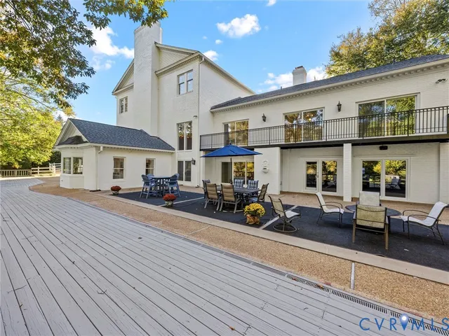 a view of a wooden deck and a lake view