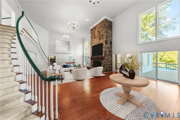 a living room with furniture or couches and a large window