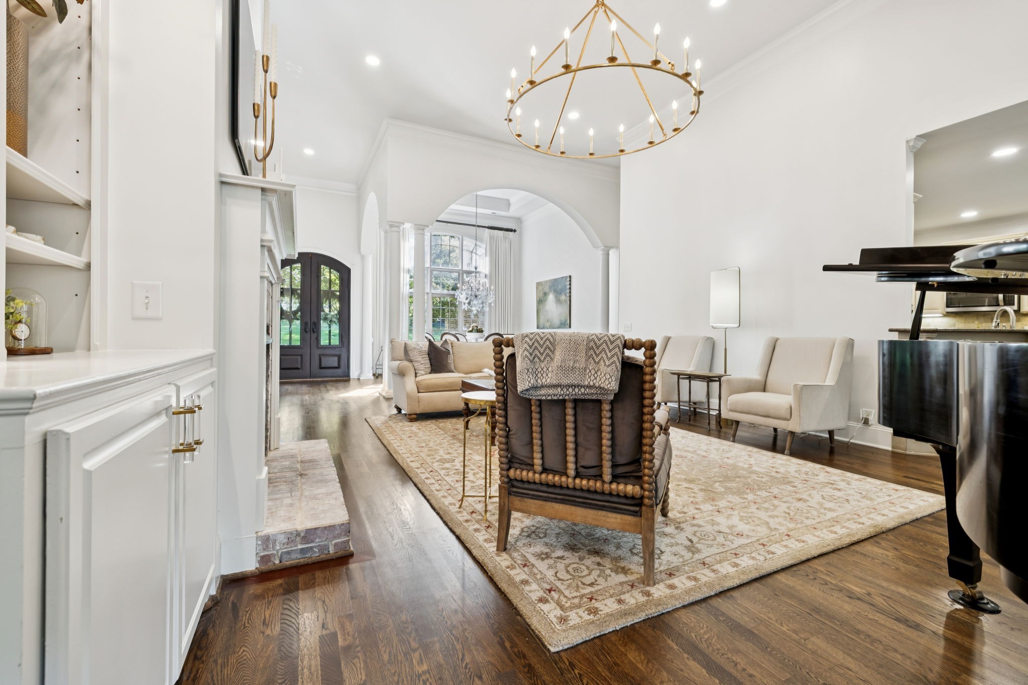 829 Highgrove Circle Franklin, TN 37069 - Photo 16 of 98 a view of a dining room with furniture a chandelier and wooden floor