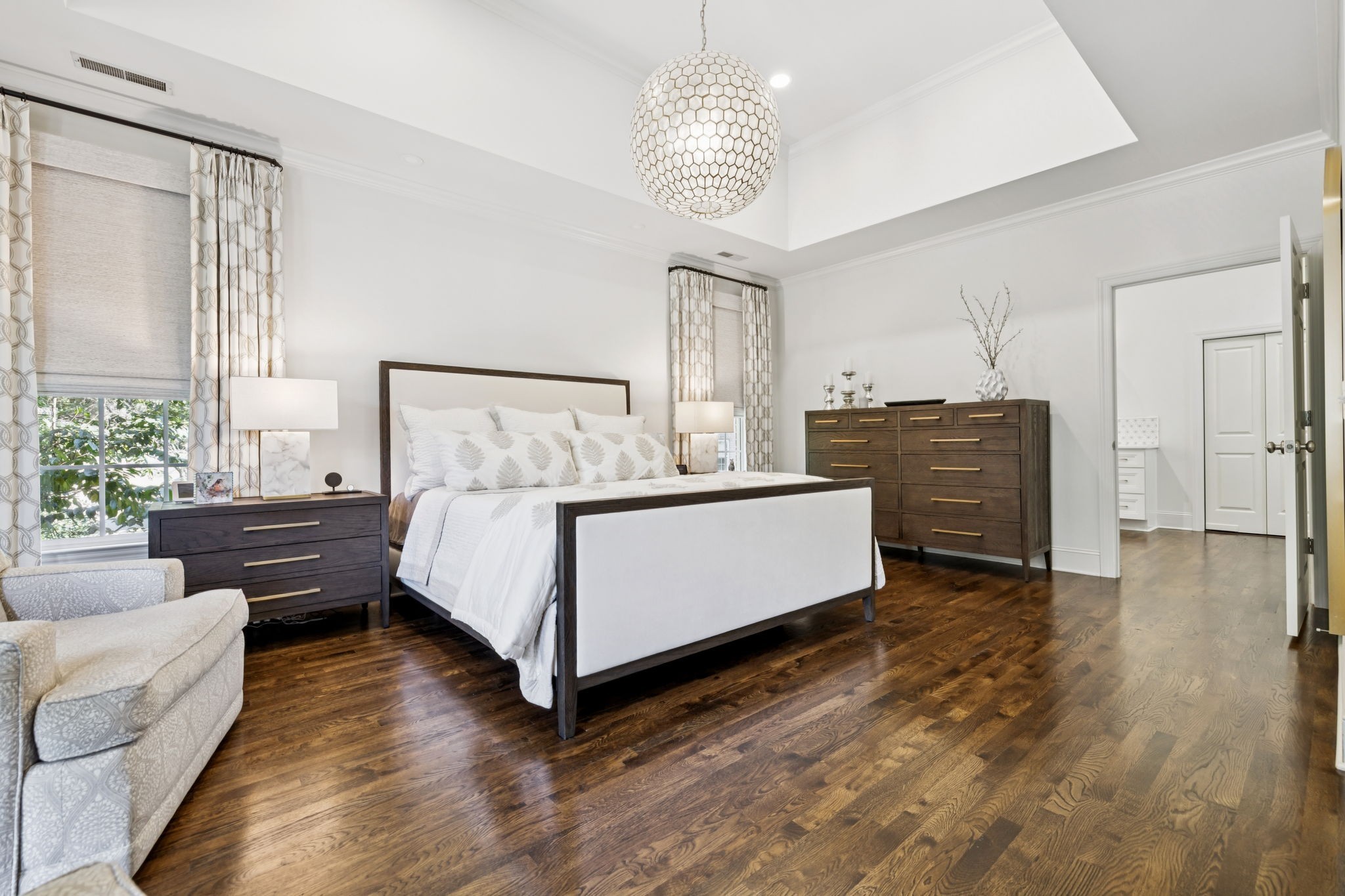 829 Highgrove Circle Franklin, TN 37069 - Photo 19 of 98 a bedroom with a bed and a chandelier