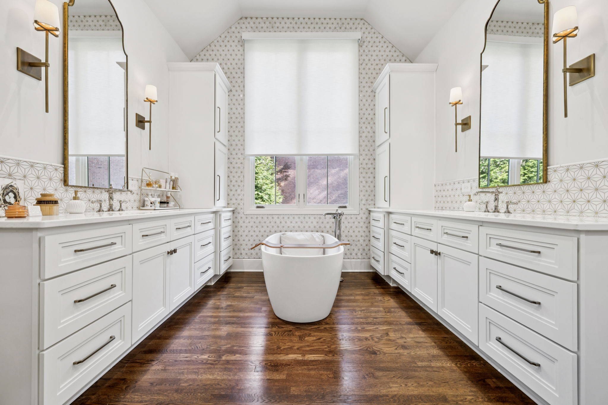829 Highgrove Circle Franklin, TN 37069 - Photo 20 of 98 a bathroom with a double vanity sink a mirror and a bathtub