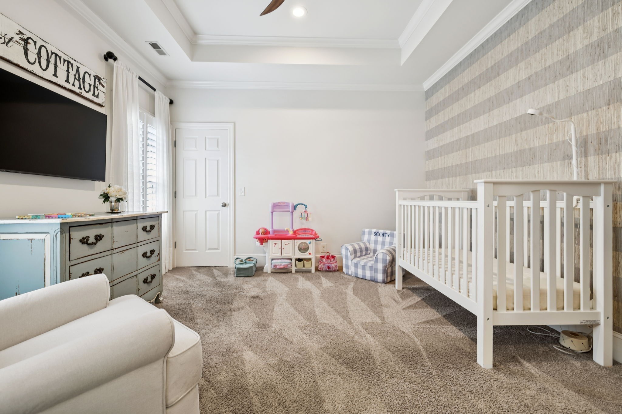 829 Highgrove Circle Franklin, TN 37069 - Photo 32 of 98 a bedroom with a bed and a flat tv screen on the dresser