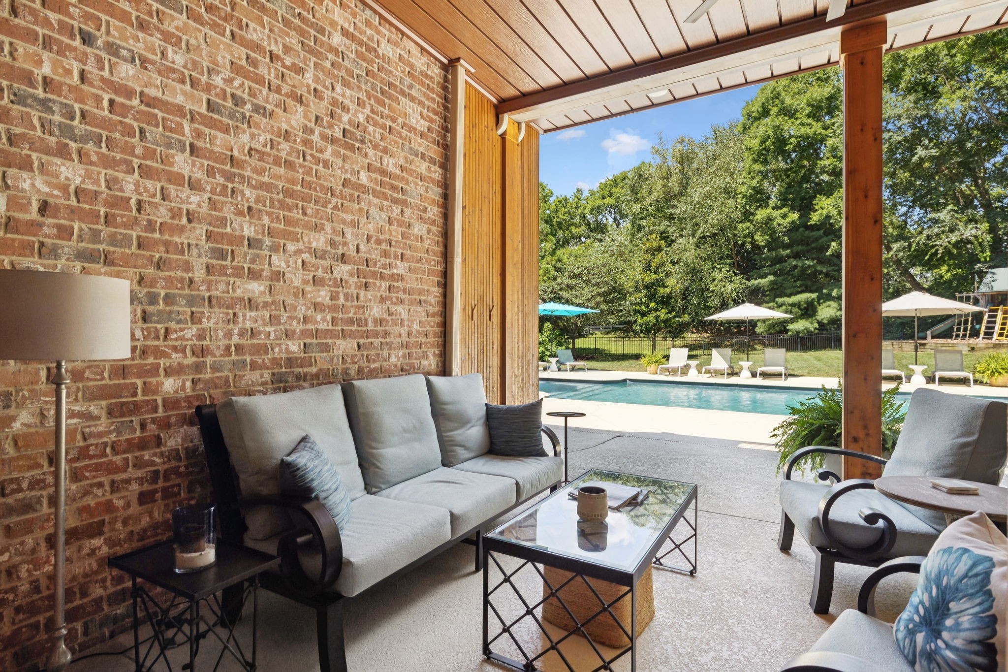 829 Highgrove Circle Franklin, TN 37069 - Photo 68 of 98 a outdoor living space with furniture and a floor to ceiling window