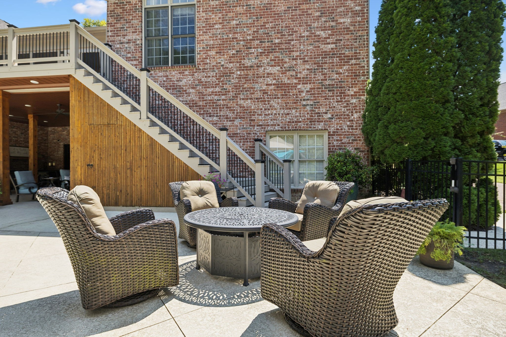 829 Highgrove Circle Franklin, TN 37069 - Photo 72 of 98 a view of a patio with couches table and chairs and potted plants