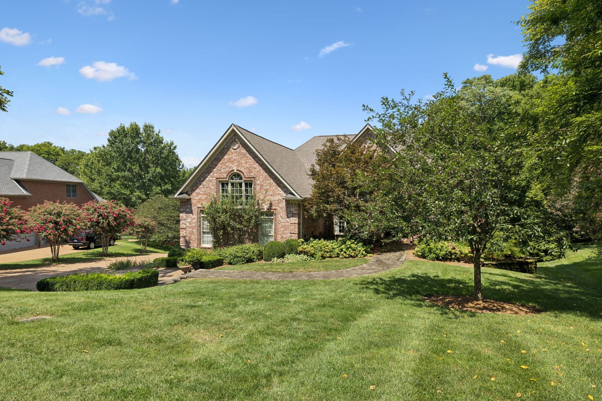 829 Highgrove Circle Franklin, TN 37069 - Photo 81 of 98 a front view of a house with a yard and trees