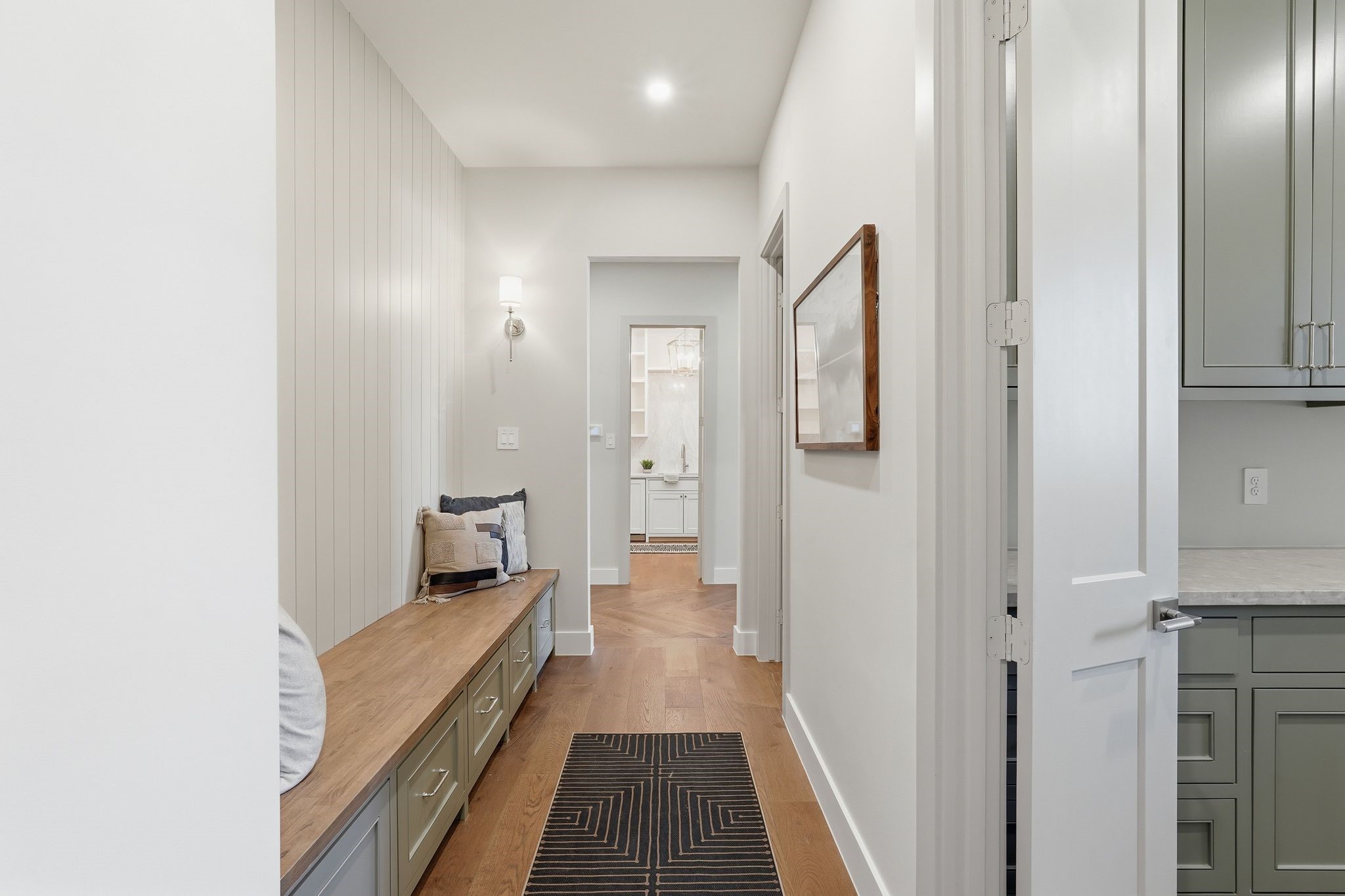 7248 Red Oak Grove Road Montgomery, TX 77316 - Photo 21 of 50 a view of a hallway with wooden floor and a bathroom