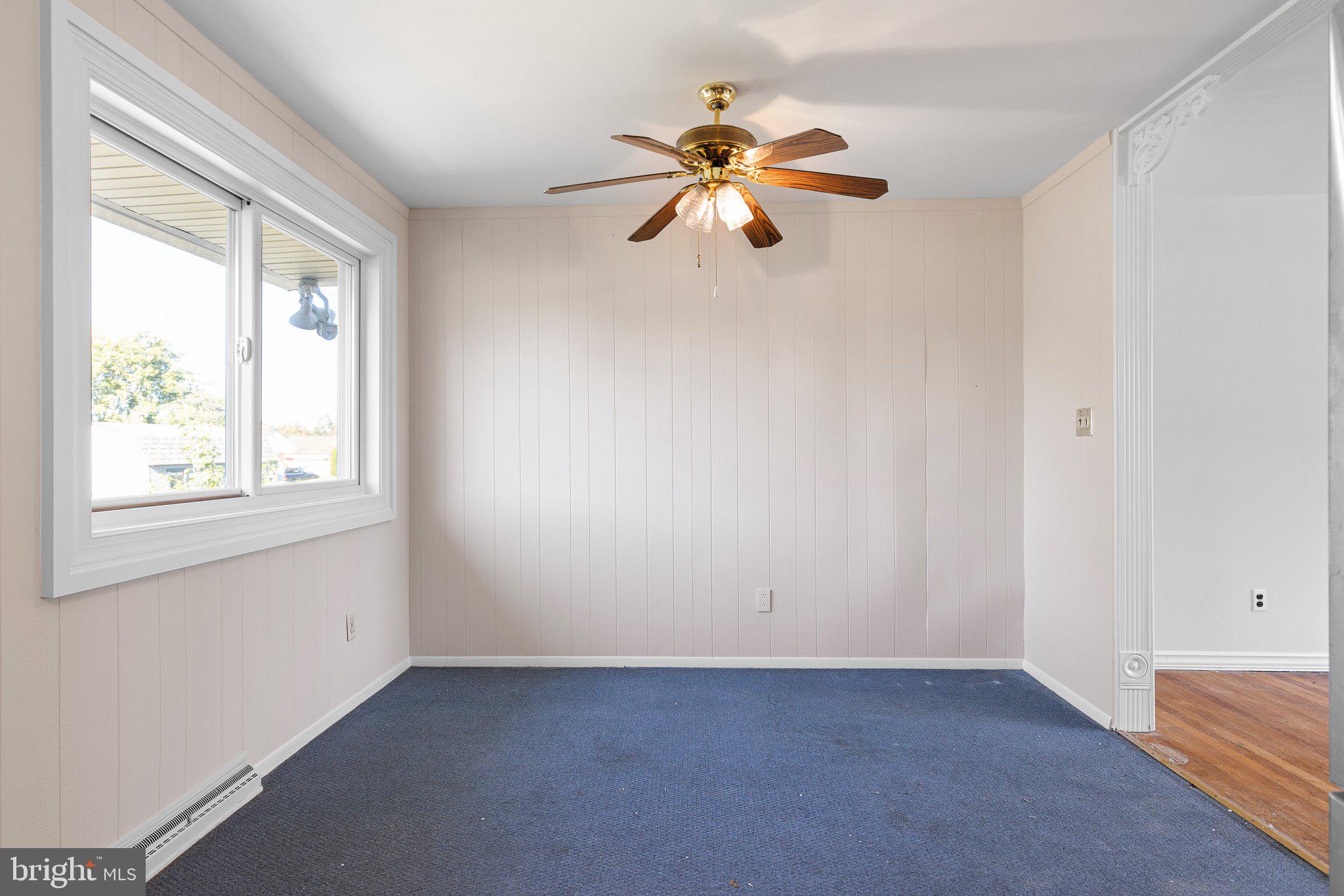 8 Trevett Boulevard Newark, DE 19702 - Photo 7 of 23 an empty room with windows and fan