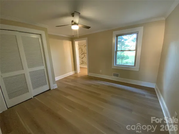 a view of livingroom with hardwood floor and window