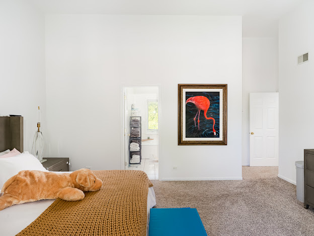 918 Meadow Road Northbrook, IL 60062 - Photo 15 of 38 a bedroom with a bed and cupboard