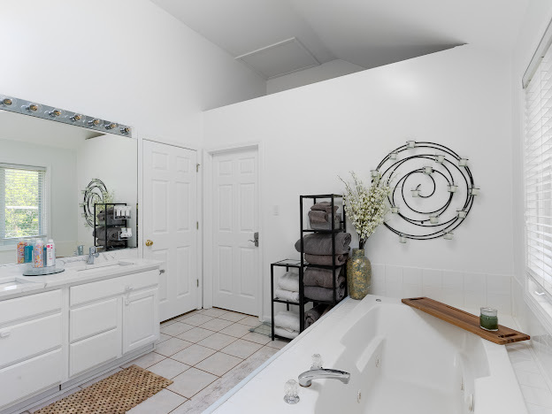 918 Meadow Road Northbrook, IL 60062 - Photo 17 of 38 a bedroom with a bed and a sink