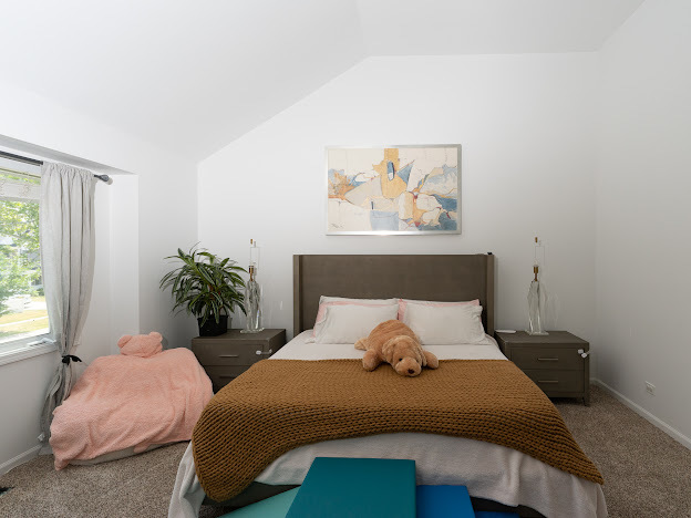 918 Meadow Road Northbrook, IL 60062 - Photo 20 of 38 a bedroom with a bed and painting on the wall