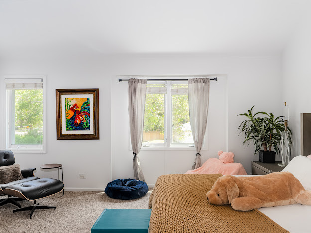 918 Meadow Road Northbrook, IL 60062 - Photo 22 of 38 a bedroom with a bed and a window