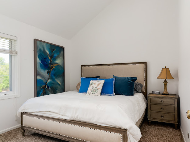 918 Meadow Road Northbrook, IL 60062 - Photo 33 of 38 a bedroom with a bed and wooden floor