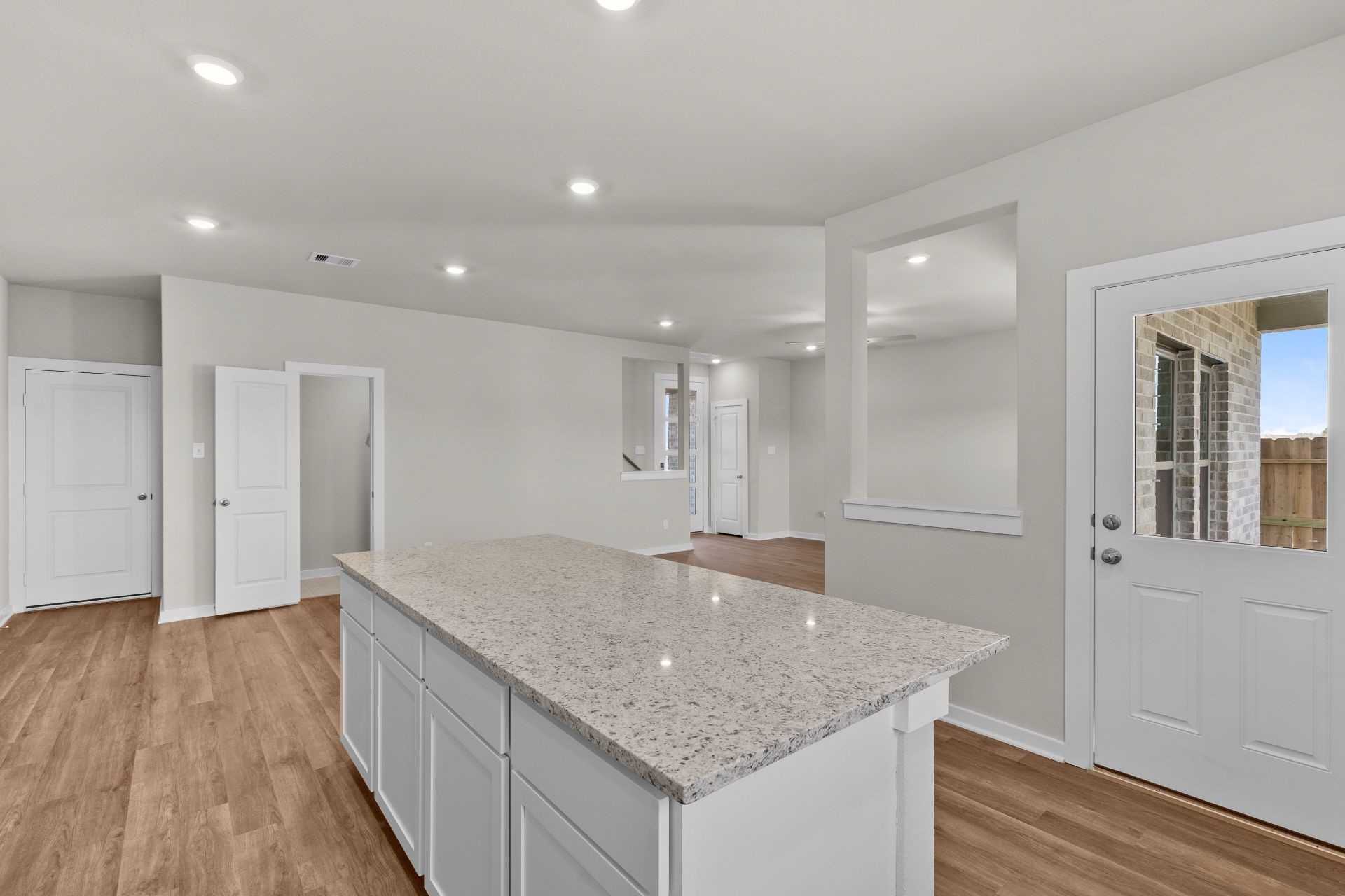 13319 Prado Rdg Lane Rosharon, TX 77583 - Photo 4 of 33 a view of kitchen island wooden floor center island and stainless steel appliances