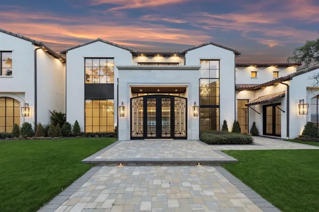 a view of a building with a yard