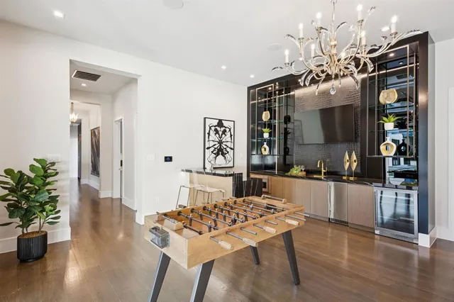 a kitchen with a table and chairs in it