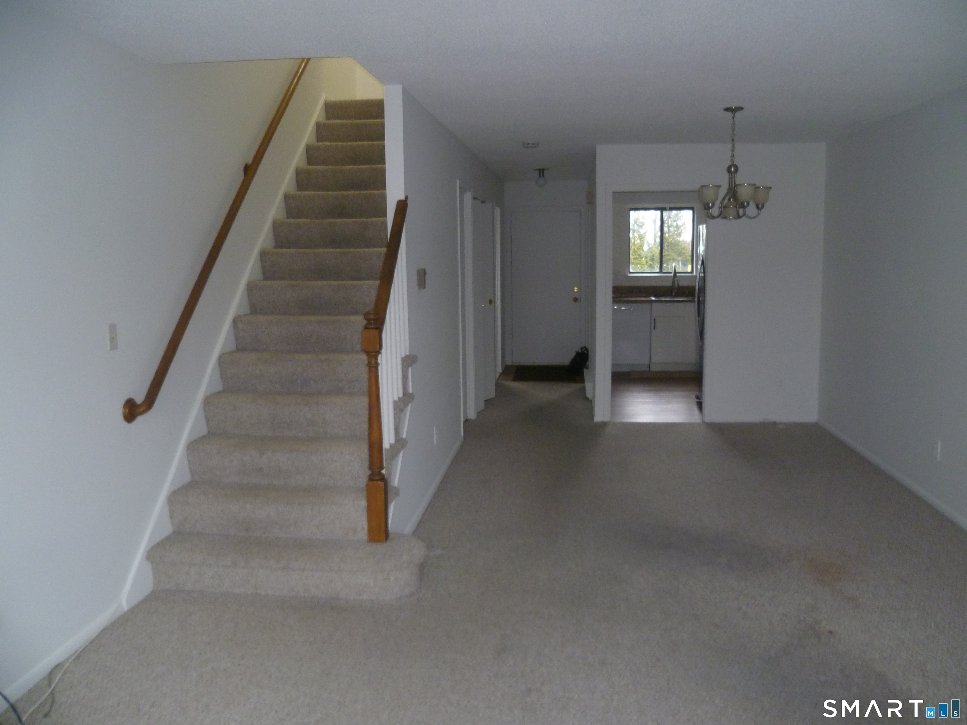 560 Yale Avenue, Unit 4 Meriden, CT 06450 - Photo 5 of 8 a view of a hallway with stairs