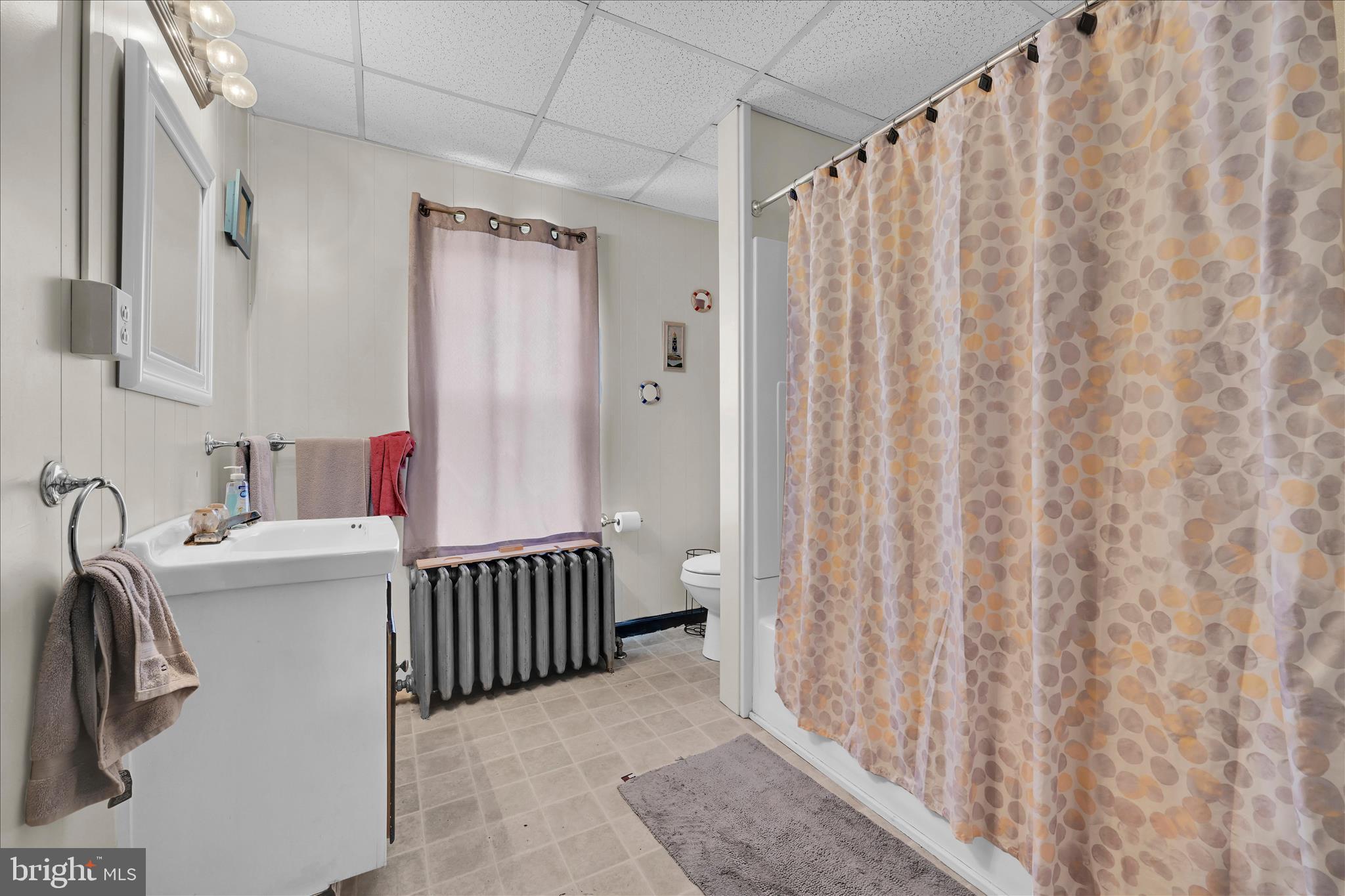 942 Pike Street Reading, PA 19604 - Photo 19 of 27 a hallway with a sink and a window