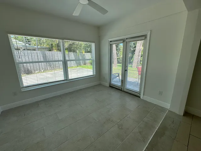 an empty room with windows