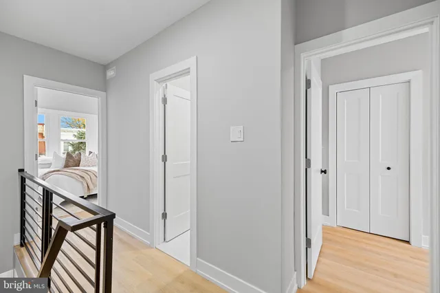 a bedroom with a bed and a mirror