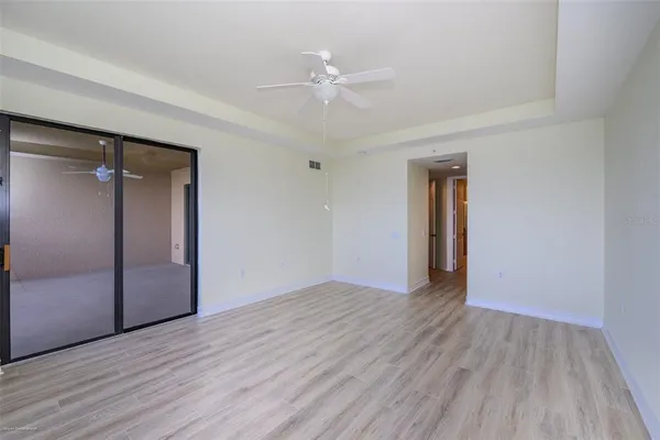 a bathroom with a tub shower vanity and a sink