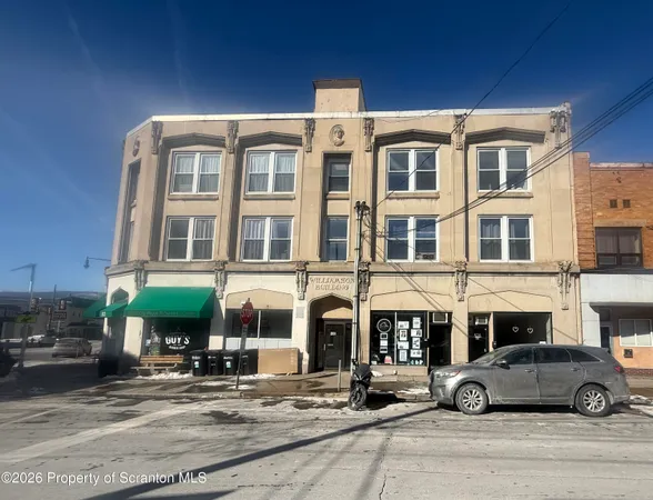a car parked in front of a building