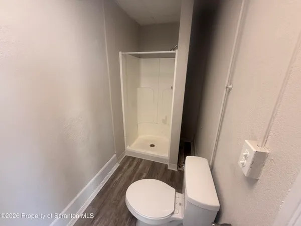 a bathroom with a toilet