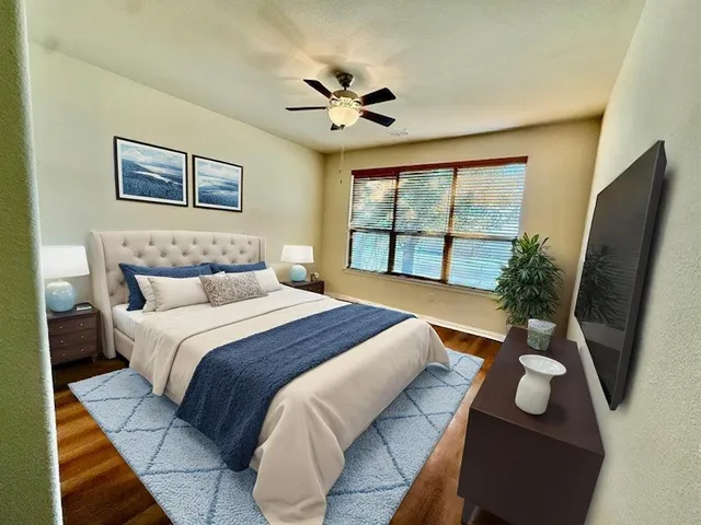 a bathroom with a double vanity sink and mirror