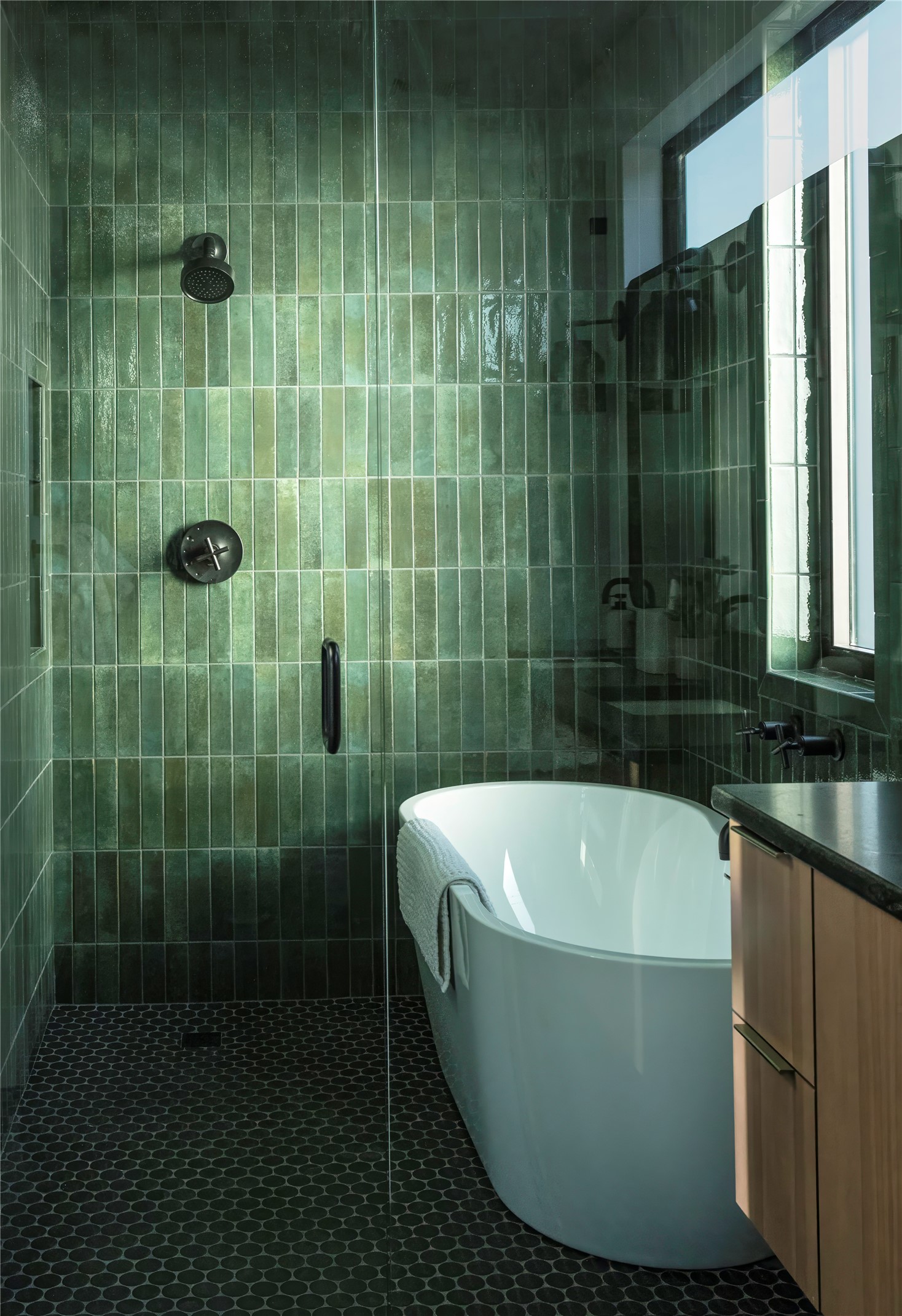 310 Hye Springs Road, Unit 107 Hye, TX 78635 - Photo 8 of 20 Spa-inspired bathroom featuring floor-to-ceiling green tile, soaking tub, walk-in shower, and modern matte black fixtures.