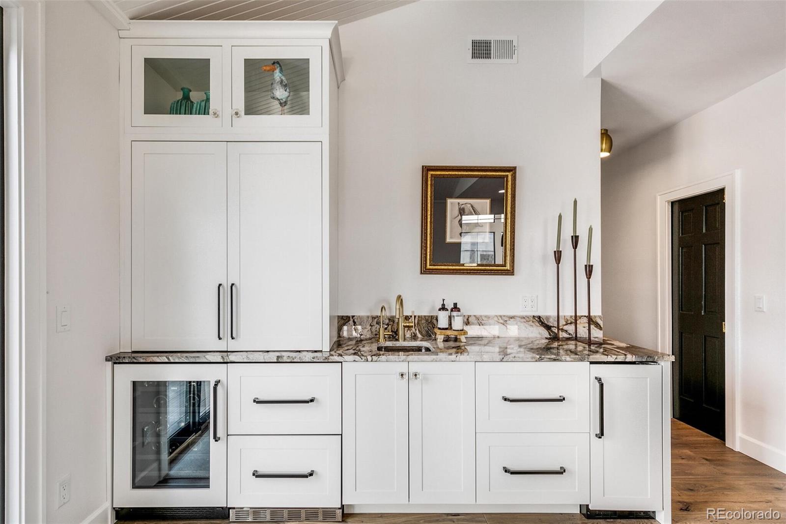 1128 County Road 65 Evergreen, CO 80439 - Photo 11 of 40 a bathroom with a sink and a mirror
