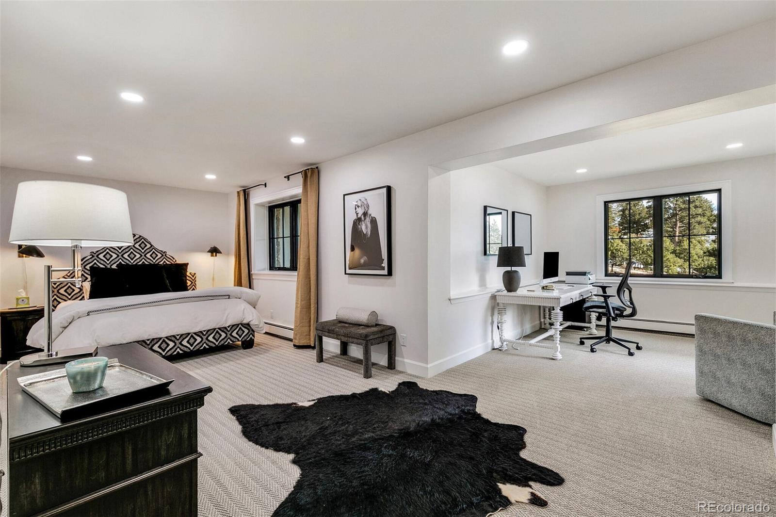1128 County Road 65 Evergreen, CO 80439 - Photo 27 of 40 a living room with furniture rug and window