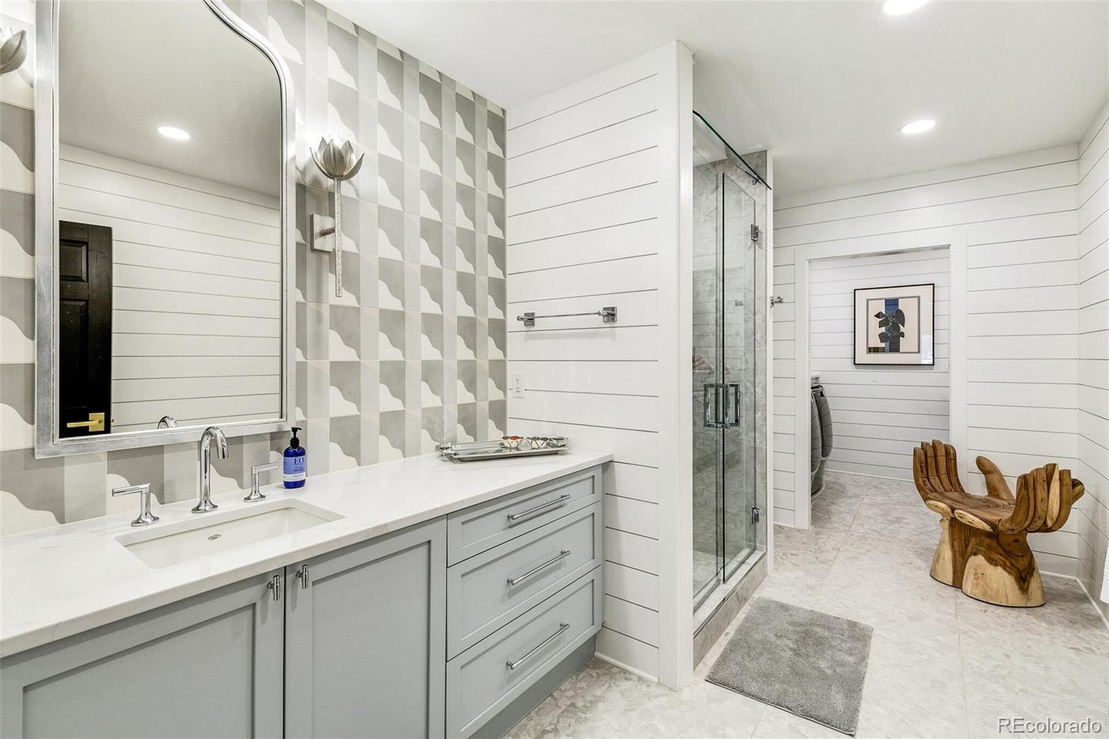 1128 County Road 65 Evergreen, CO 80439 - Photo 28 of 40 a bathroom with a double vanity sink mirror and double