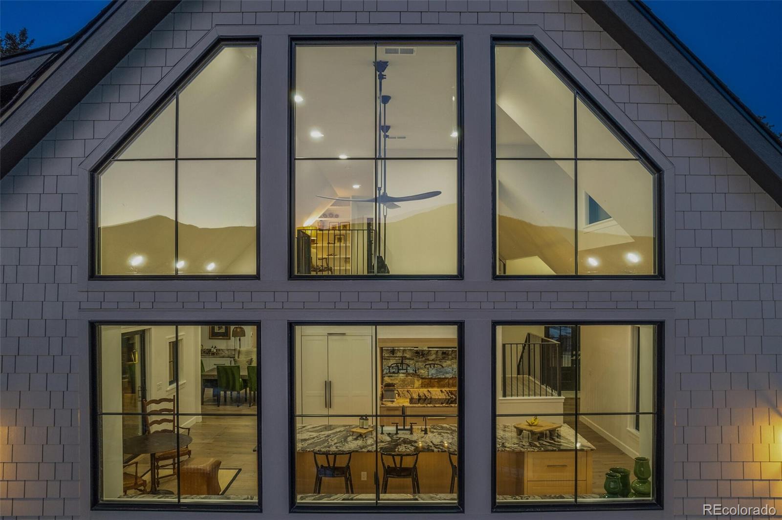 1128 County Road 65 Evergreen, CO 80439 - Photo 38 of 40 a front view of a building with a glass door