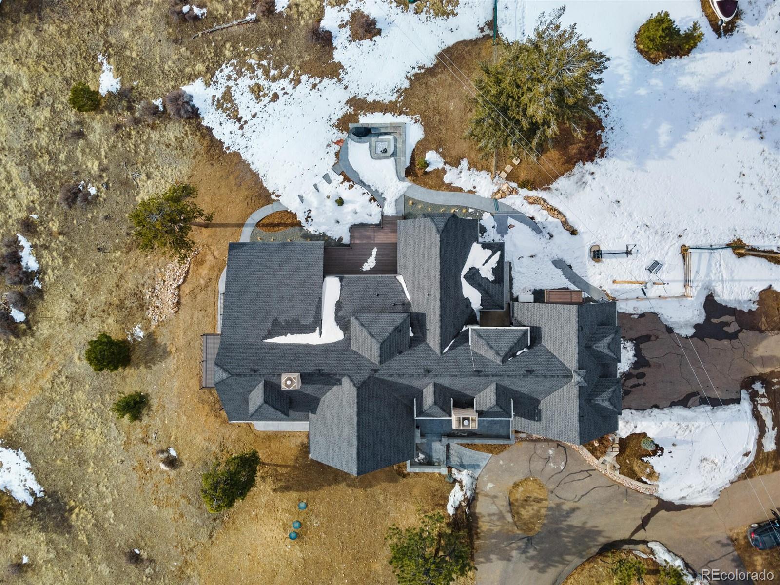 1128 County Road 65 Evergreen, CO 80439 - Photo 39 of 40 a picture of houses with outdoor seating