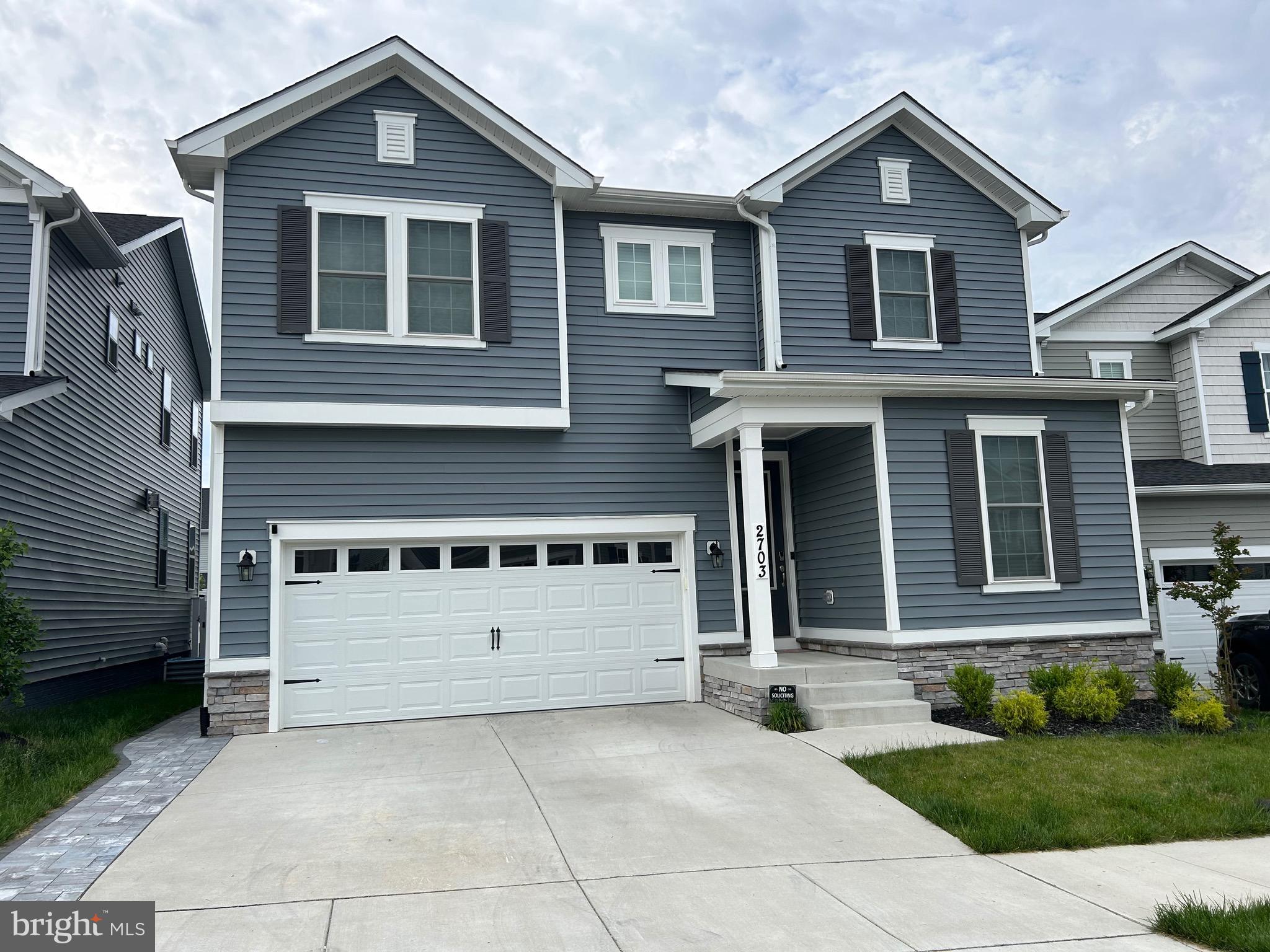2703 Grasshopper Drive Odenton, MD 21113 - Photo 1 of 14 a front view of a house with a yard