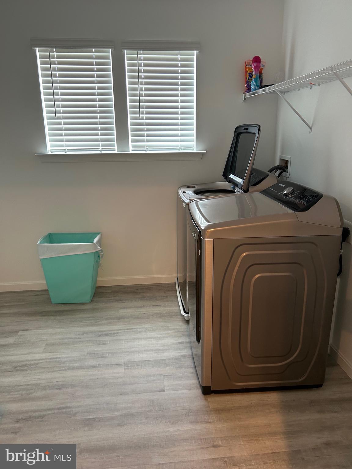 2703 Grasshopper Drive Odenton, MD 21113 - Photo 5 of 14 a view of a storage & utility room with a window