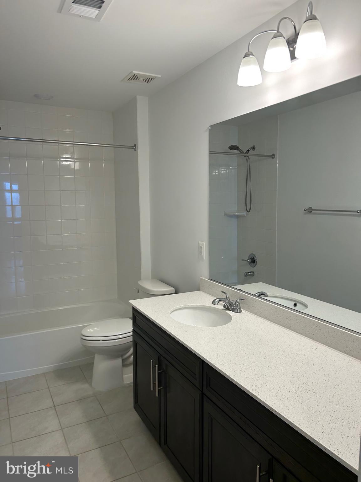 2703 Grasshopper Drive Odenton, MD 21113 - Photo 6 of 14 a bathroom with a sink a toilet and shower