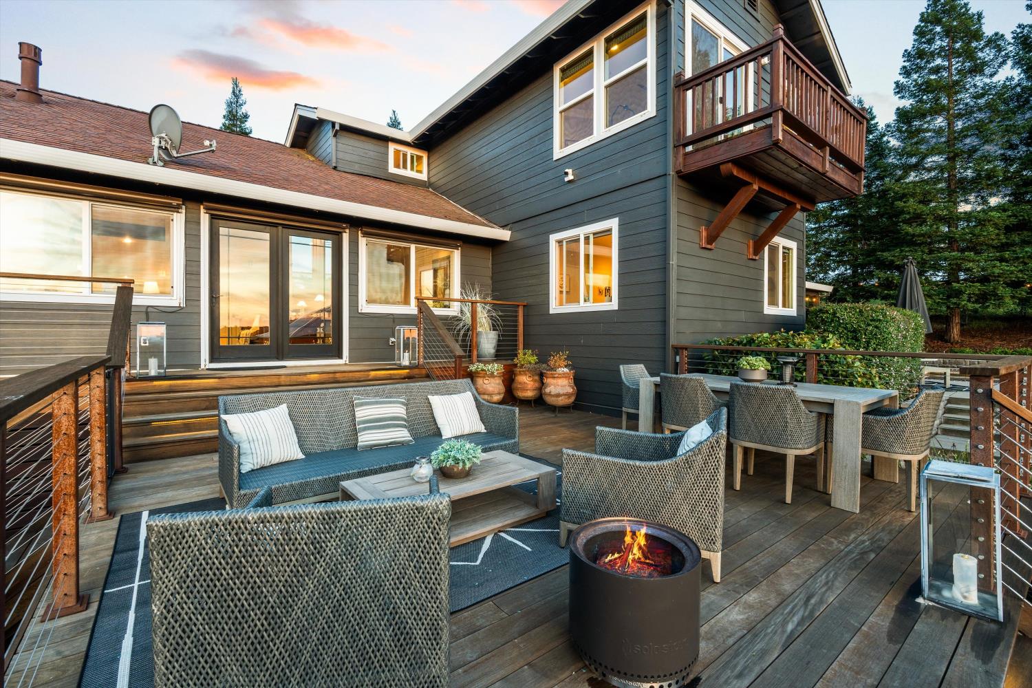 7380 Ridge Road Newcastle, CA 95658 - Photo 73 of 97 a view of a patio with couches table and chairs and potted plants