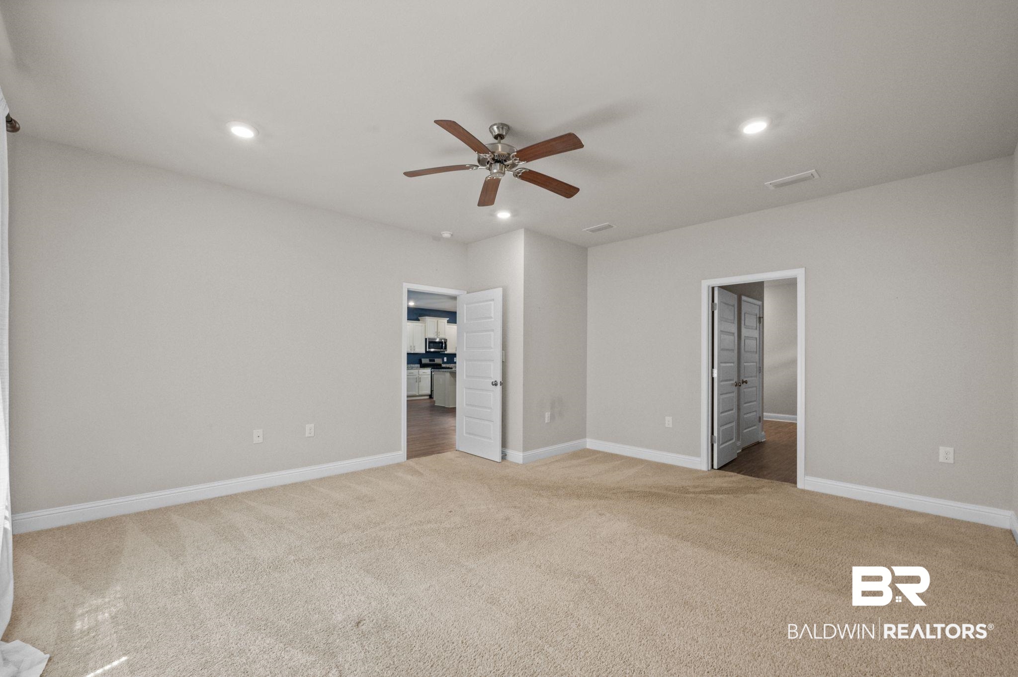 24769 Slater Mill Road Daphne, AL 36526 - Photo 20 of 38 Interior space with ceiling fan and light carpet