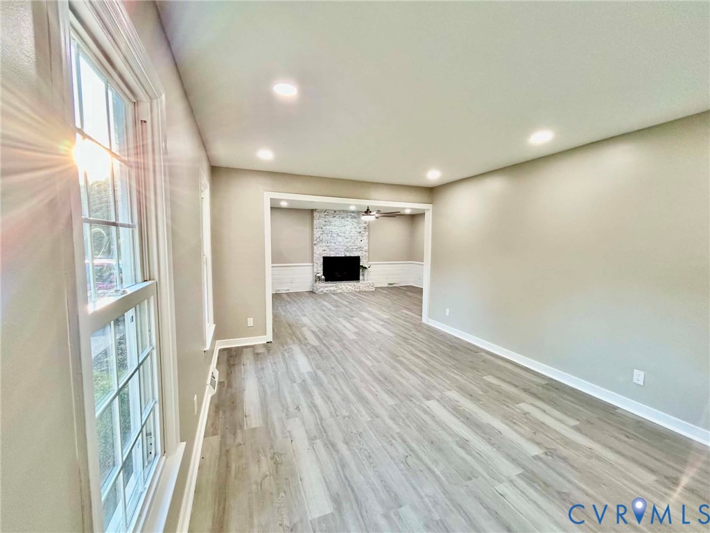 7110 Manning Road Chesterfield, VA 23832 - Photo 9 of 50 Recessed lighting, light gray wall paint, wood-fin
