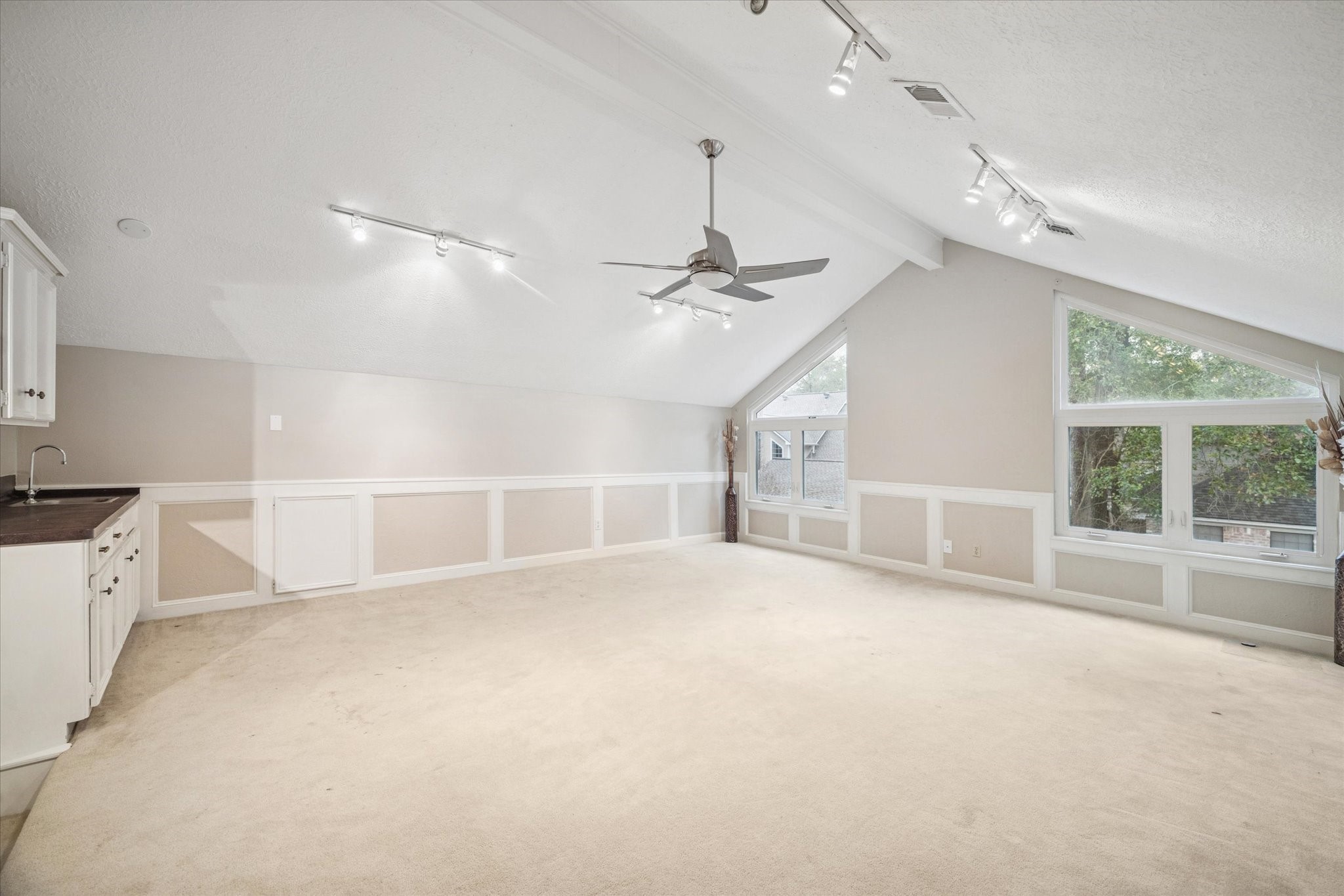 6723 Apple Valley Lane Houston, TX 77069 - Photo 15 of 25 a view of a livingroom with a ceiling fan and window
